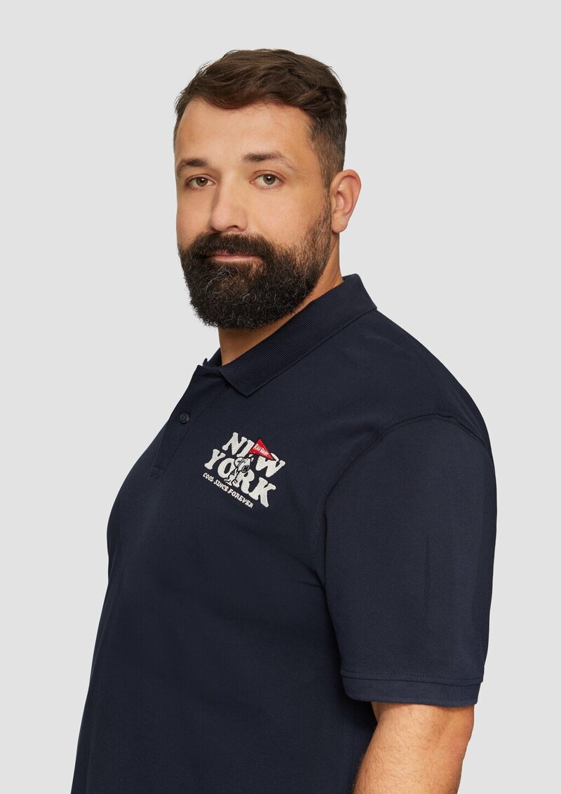 Poloshirt aus Baumwollpiqué mit Peanuts®-Motiv