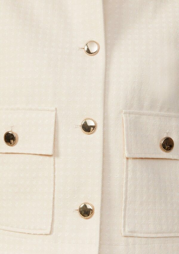 Leichte Jacke mit Strukturmuster und goldfarbenen Knöpfen