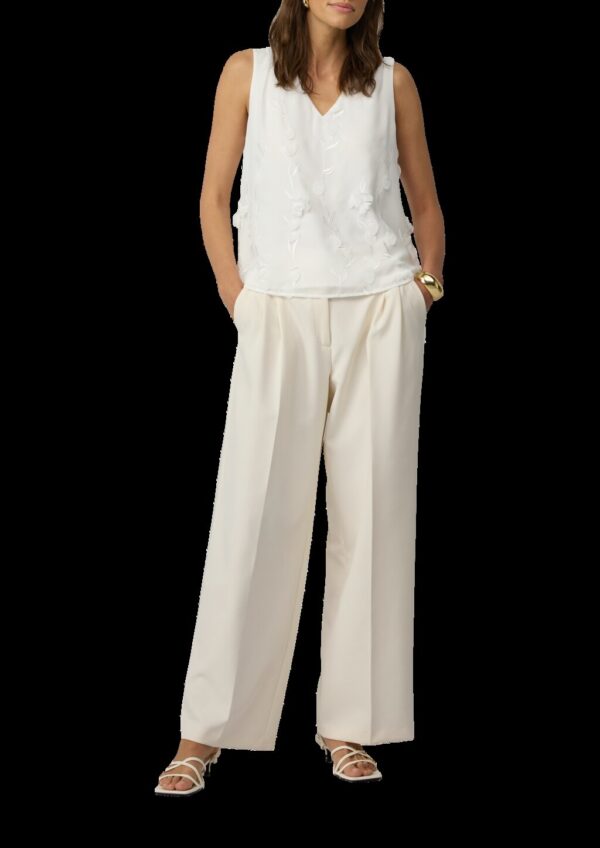 Ärmellose Bluse mit V-Ausschnitt und floralen Applikationen