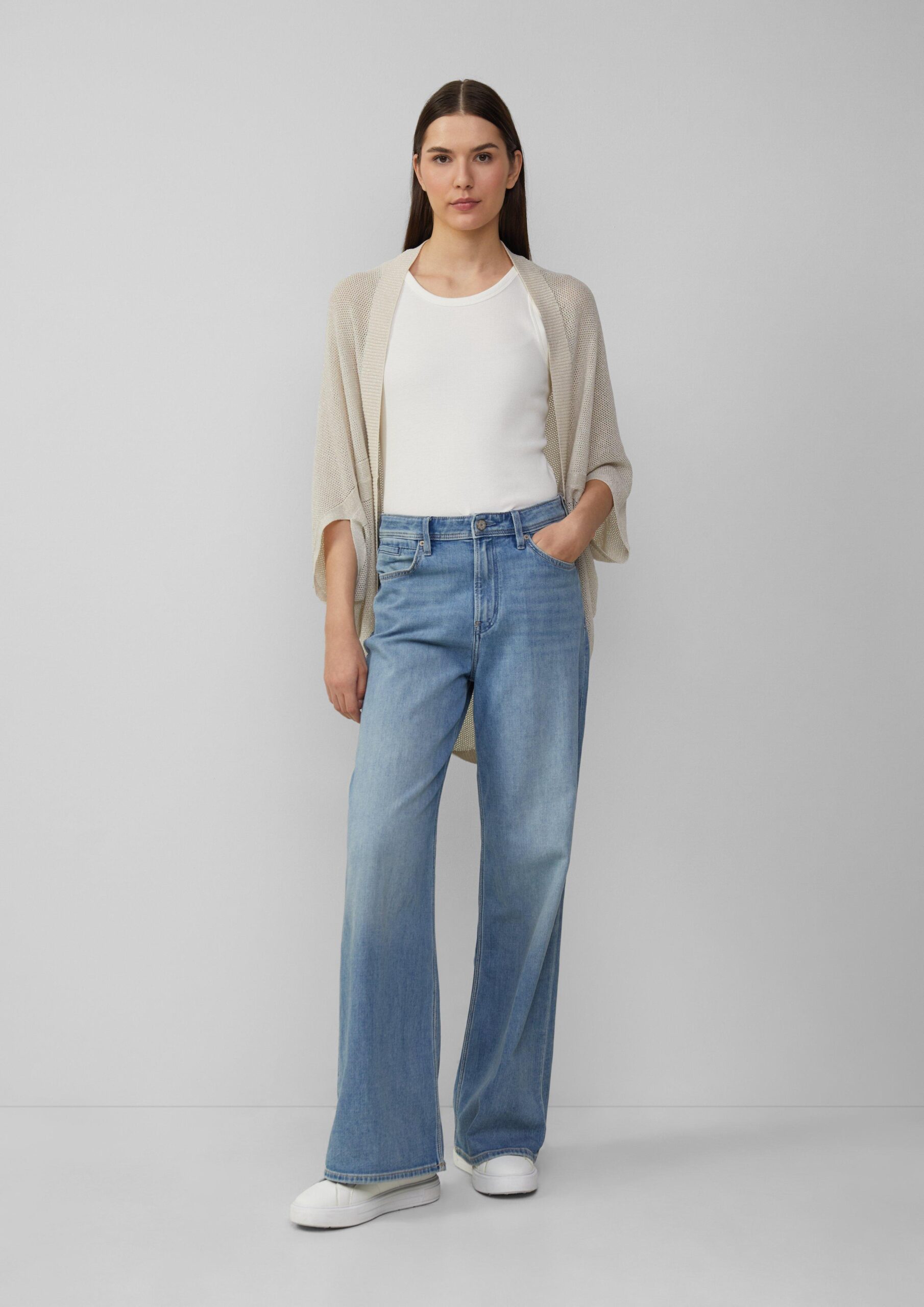 Strickponcho mit Glitzergarn