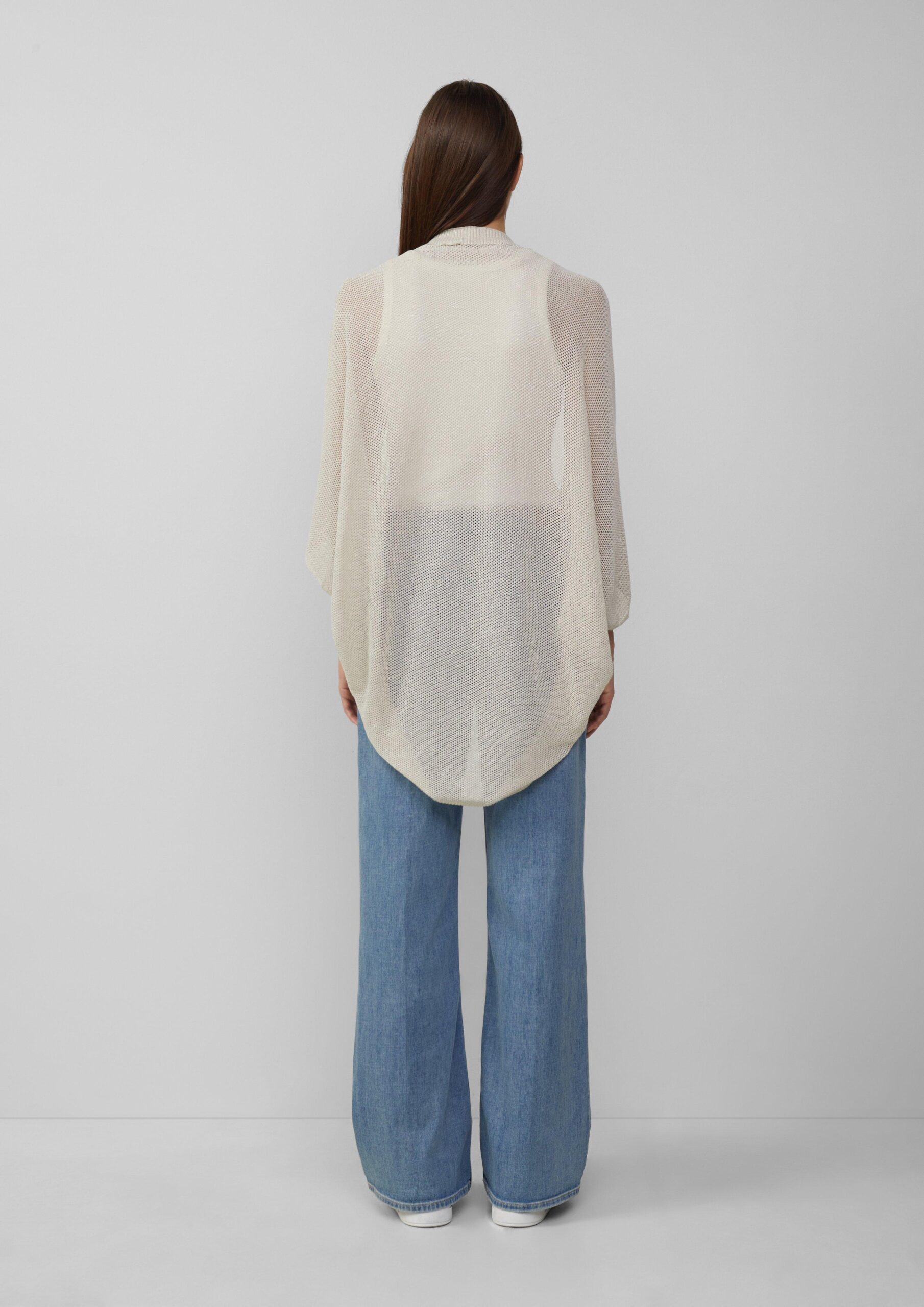 Strickponcho mit Glitzergarn