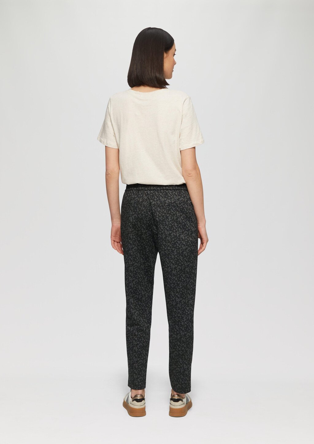 Gemusterte Jogpants und Reißverschlusstaschen