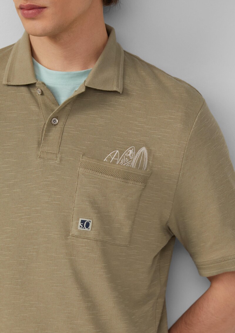 Flammgarn-Poloshirt mit Brusttasche und Stickerei