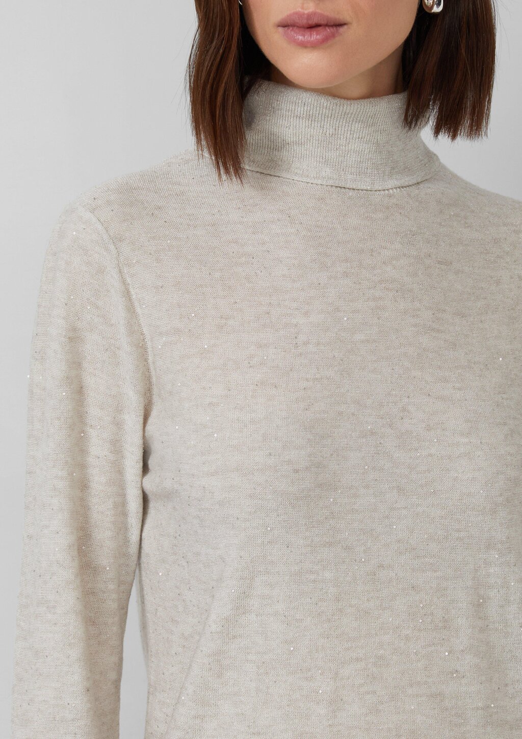 Rollkragenpullover mit feinen Pailletten