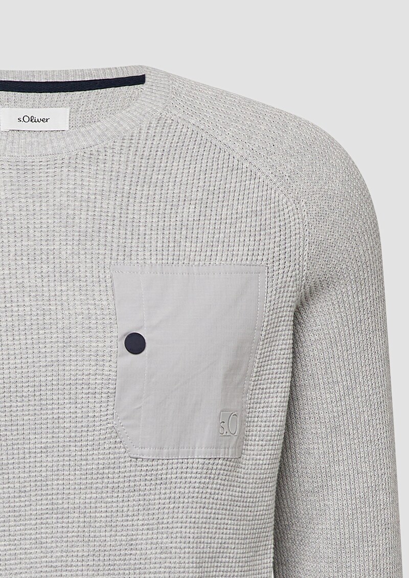 Strickpullover mit Brusttasche und Druckknopf