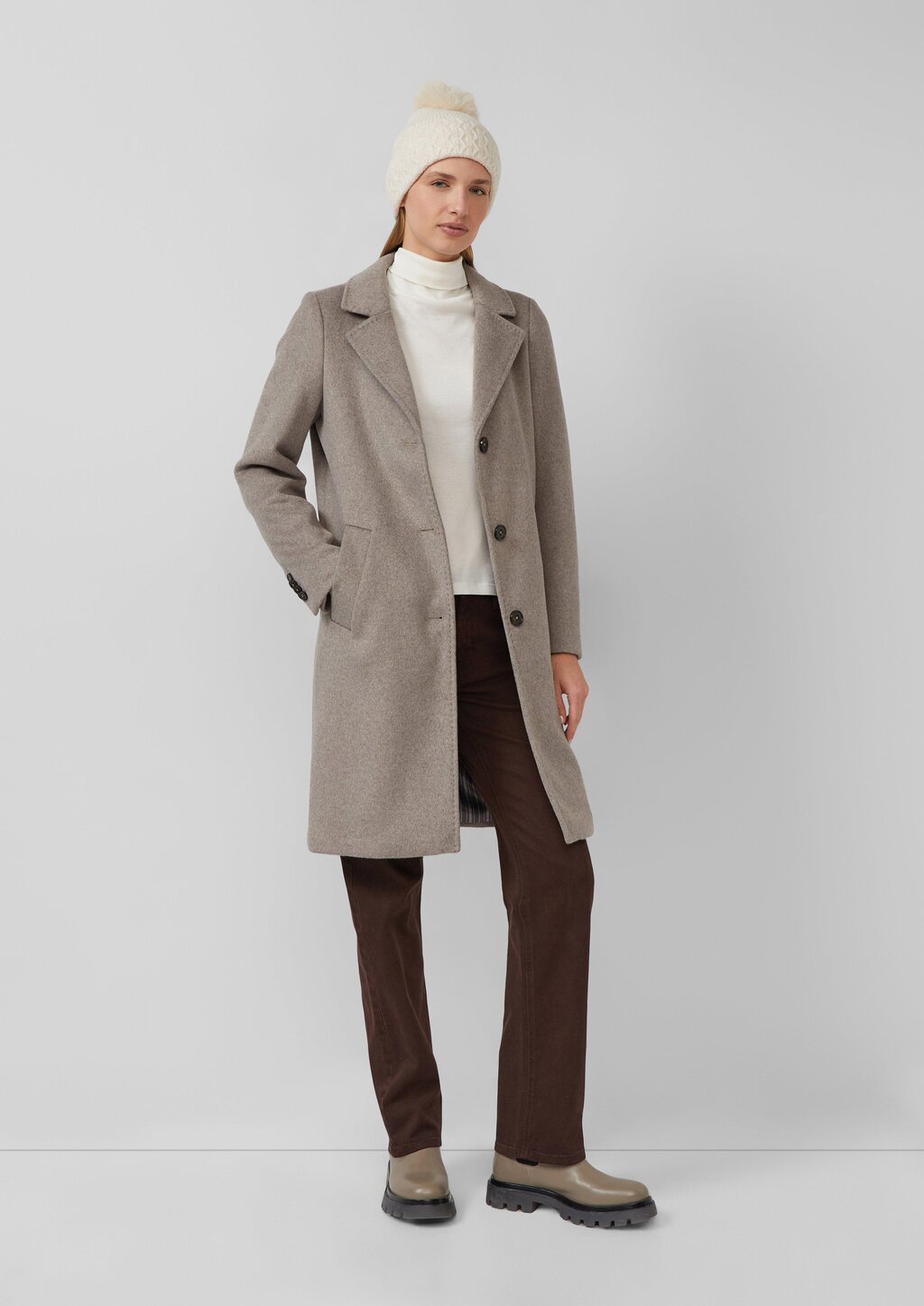 Strickmütze mit Fellimitat-Bommel und Fleece-Einsatz