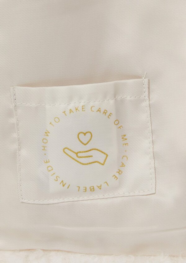 Weste aus Teddyplüsch mit Eingrifftaschen