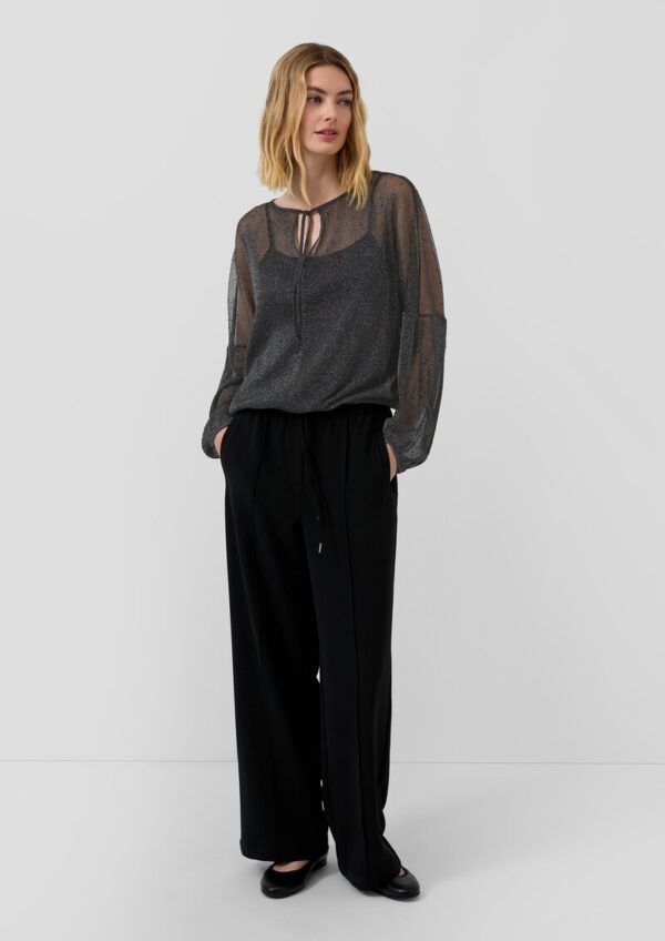 Transparente Bluse mit Glitzergarn und Schmucksteinen