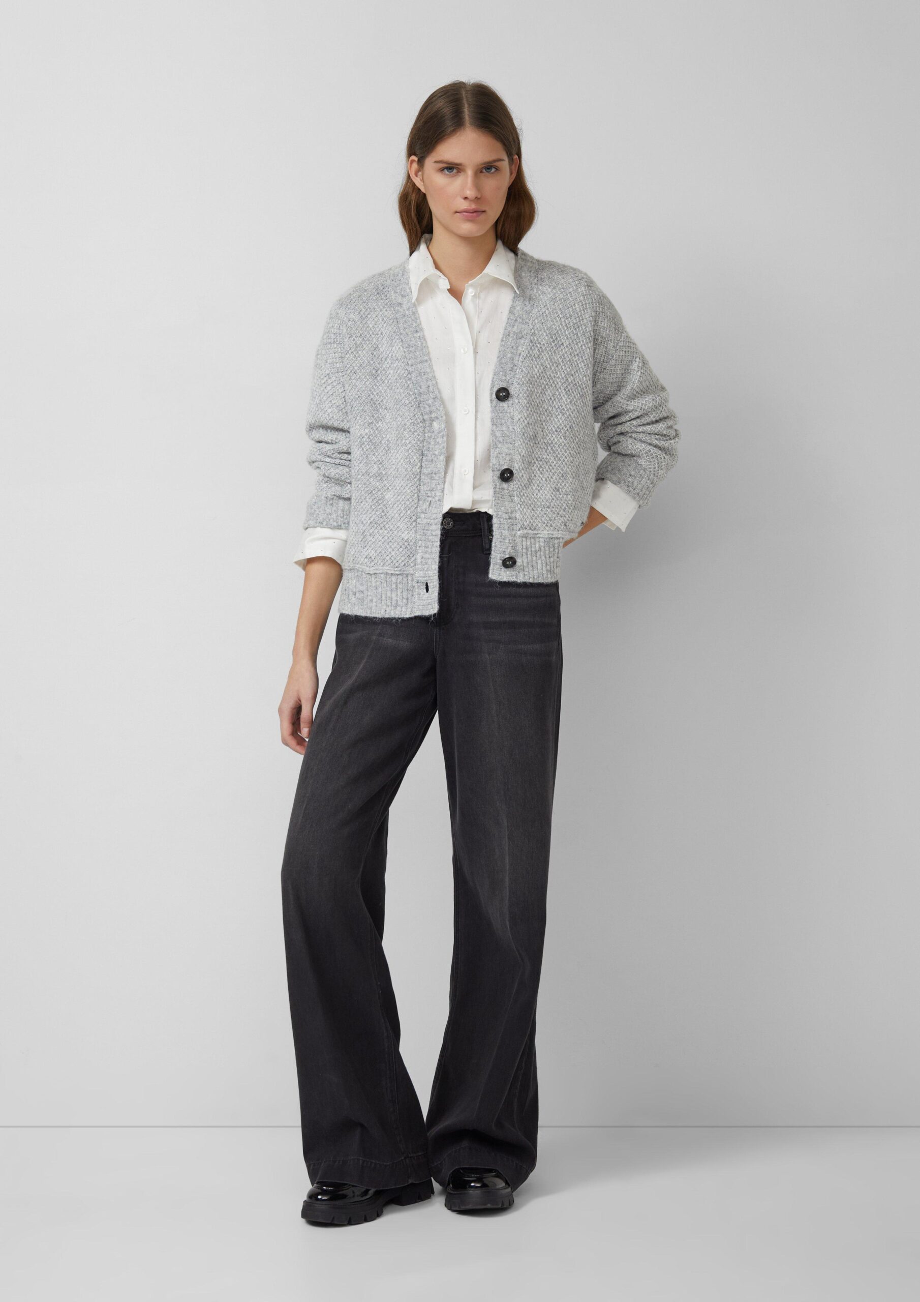 Hemdbluse mit Glitzersteinen und Schnürung am Saum