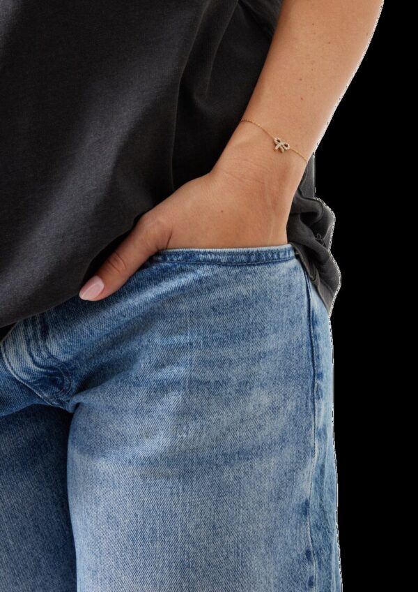 Edelstahlarmband mit goldener IP Beschichtung und Schleifen-Detail